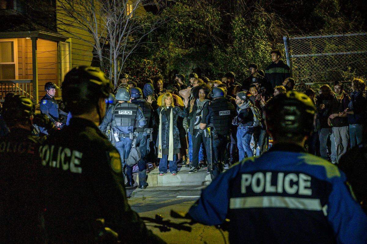 Protesters who were surrounded by Sacramento police at the end of a Stephon Clark march in East Sacramento are arrested Monday. The marchers had been forced down 51st Street by a line of police officers, where they met a line of bicycle police who prevented them from moving further south.