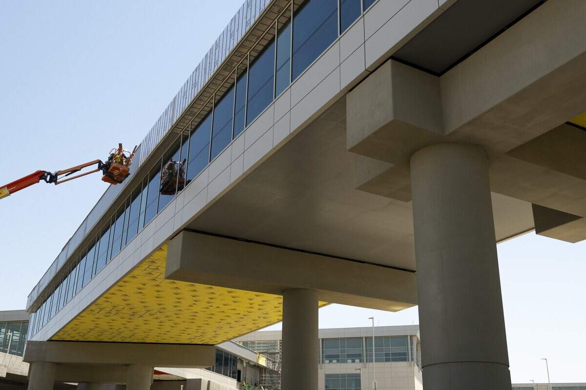 Construction continues on the new pedestrian walkway at Sacramento International Airport on Wednesday, June 17.