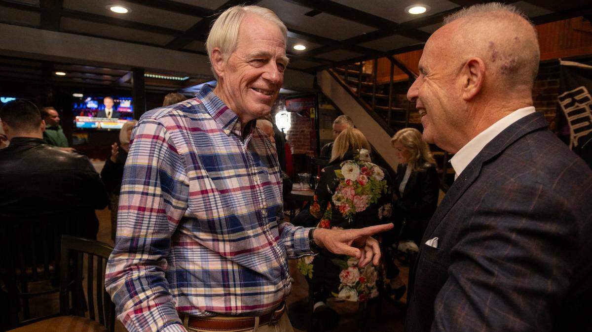 Sacramento City Council District 2 candidate Roger Dickinson talks with Mayor Darrell Steinberg during his election night party at Stoney’s Rockin Rodeo on Tuesday, Nov. 5, 2024.