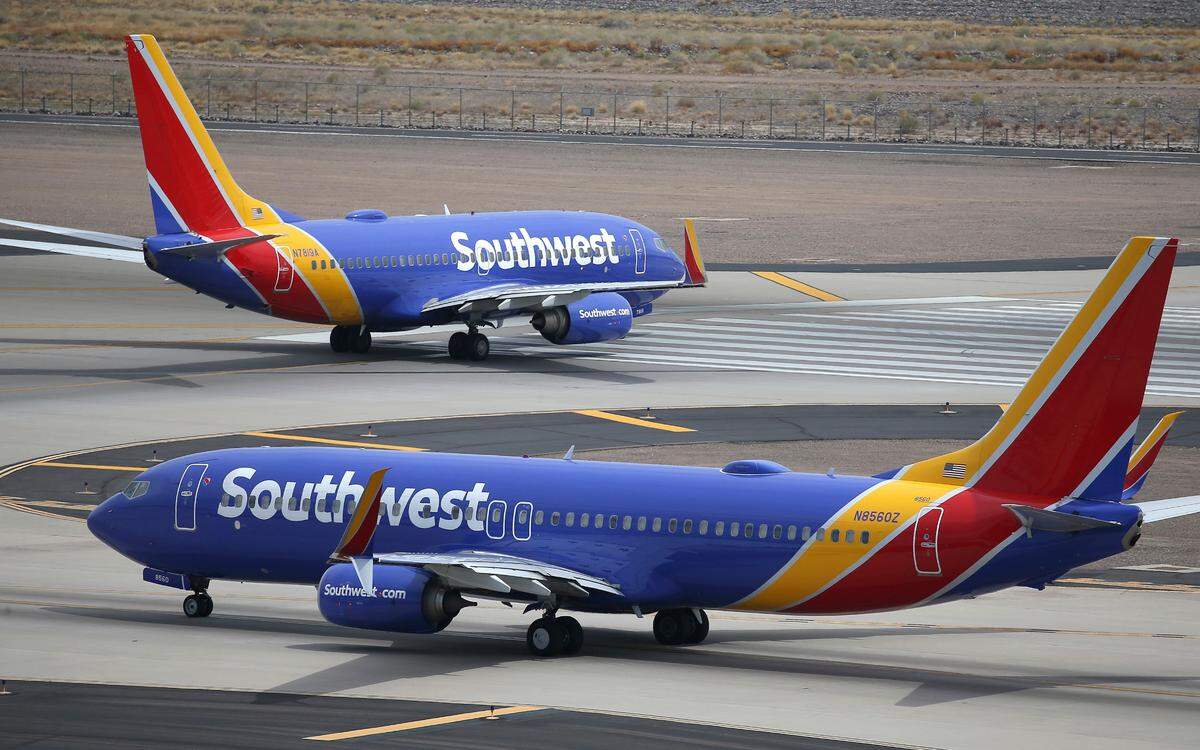FILE - Southwest Airlines planes at Phoenix Sky Harbor International Airport in Phoenix, July 17, 2019. (AP Photo/Ross D. Franklin, File)