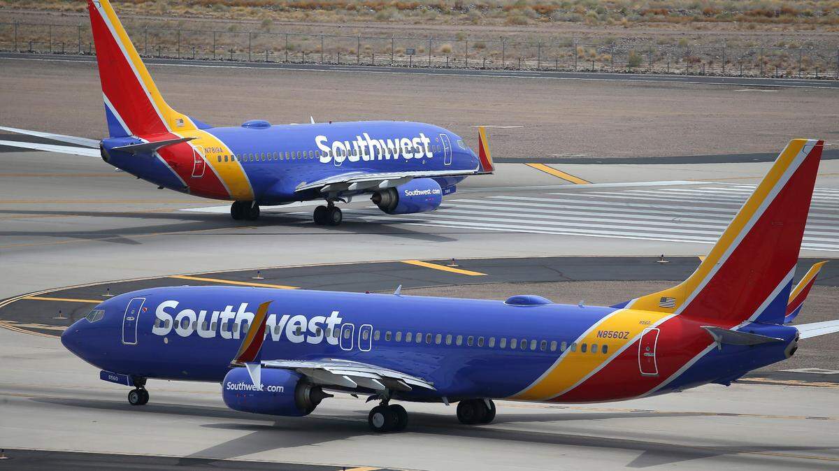 A flight attendant suffered a back injury from a hard landing in California, federal investigators said.  (AP Photo/Ross D. Franklin, File)