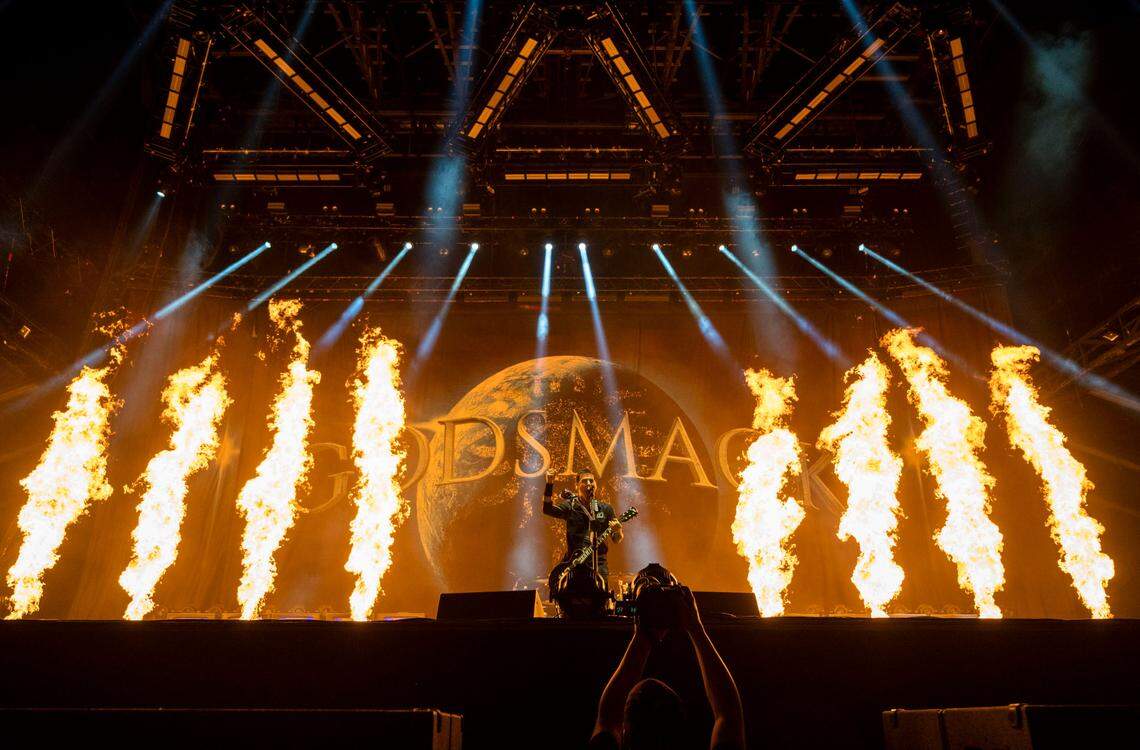 Sully Erna of Godsmack sings with pyrotechnics going off on stage during Aftershock in 2023. 
