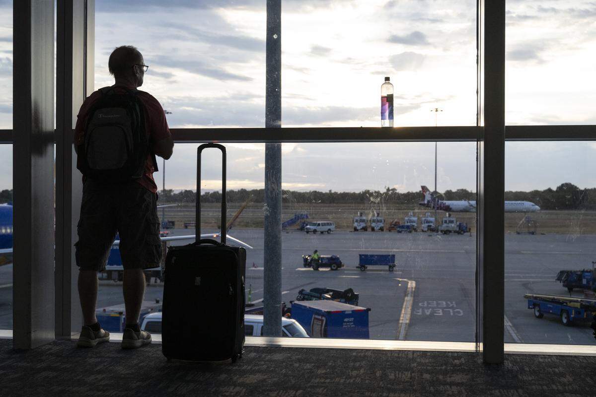 Travelers wait for their flights in Terminal B at the Sacramento International Airport on Thursday, Sept. 18, 2025.