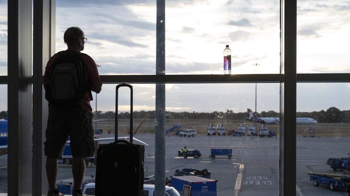 Travelers wait for their flights in Terminal B at the Sacramento International Airport on Thursday, Sept. 18, 2025.