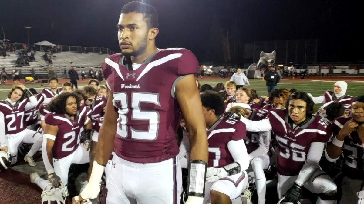 Woodcreek High School senior Isaac Earls prepares to hype up his teammates ahead of a Sac-Joaquin Section Division III semifinal playoff game against Vanden on Friday, Nov. 17, 2023, at Woodcreek High School.