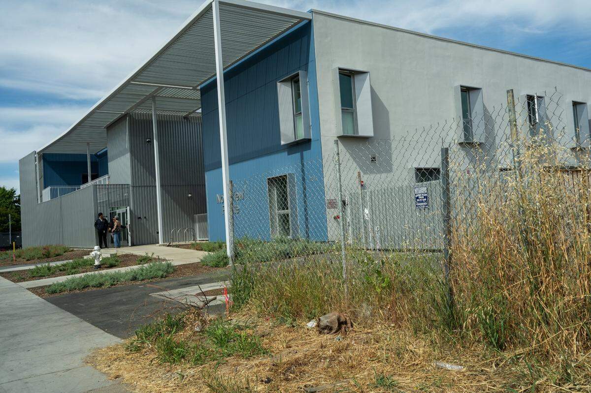 Members of the community leave a grand opening of Northview Pointe on Wednesday in North Sacramento. The new construction project was built on vacant land in the suburban neighborhood just north of the American River.