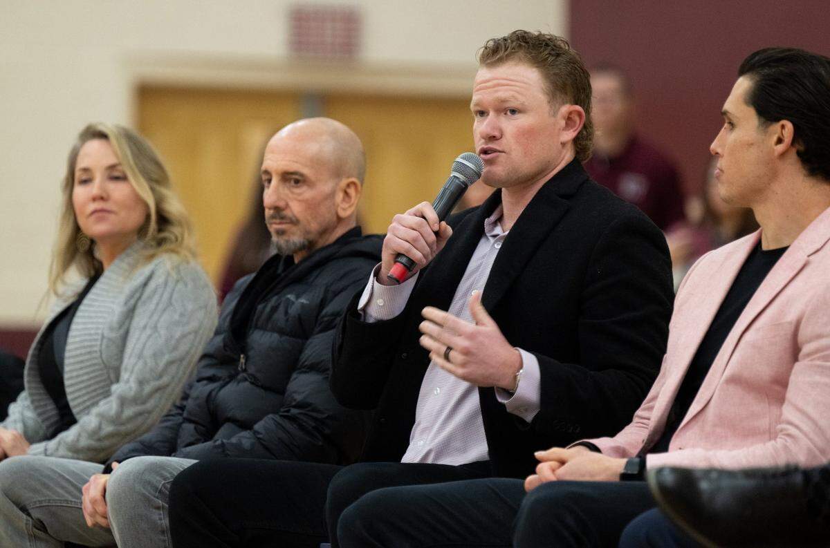 The San Francisco Giants’ Logan Webb, whose cousin Kade Webb died of a fentanyl drug overdose, speaks on Friday to Whitney High School students in Rocklin about mental health and substance abuse. Kurt Webb, Kade’s father, sits second from left.