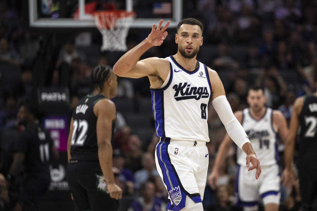 Sacramento Kings guard Zach LaVine (8) reacts after scoring three points during a game at Golden 1 Center in Sacramento on Sunday.