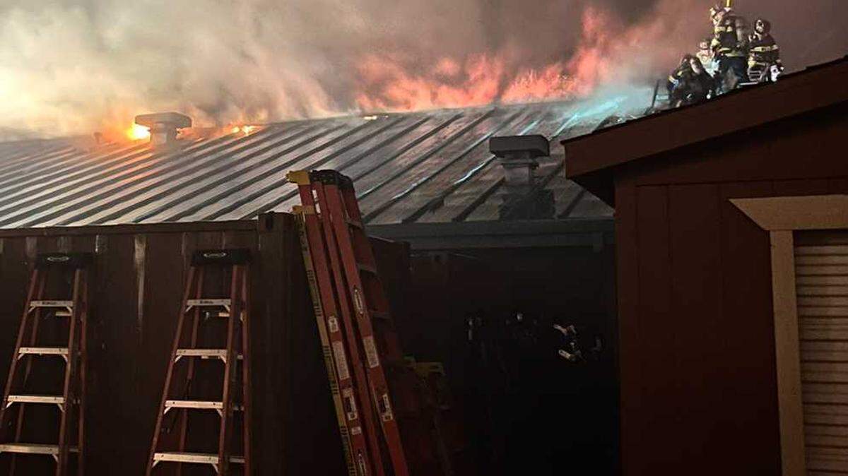 Sacramento Metropolitan Fire District crews respond to a two-alarm fire at the industrial arts building at Sheldon High School in the Vineyard area of Sacramento County on Monday, Dec. 13, 2021.