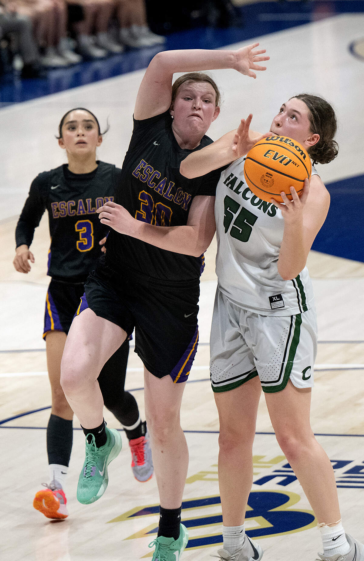 Colfax’s Juliette James draws a foul from Escalon’s Aiden Hohenwarter during the Division IV Sac-Joaquin Section championship game at UC Davis on Friday.