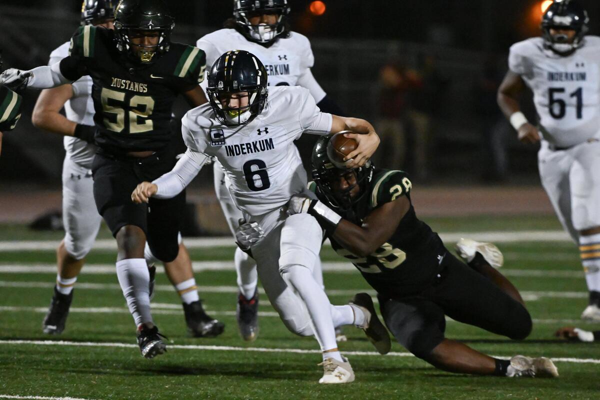 Inderkum Tigers quarterback Ricky Cole (6) runs the ball in a 2023 CIF Sac-Joaquin Division I section football quarter final against Monterey Trail in Elk Grove.