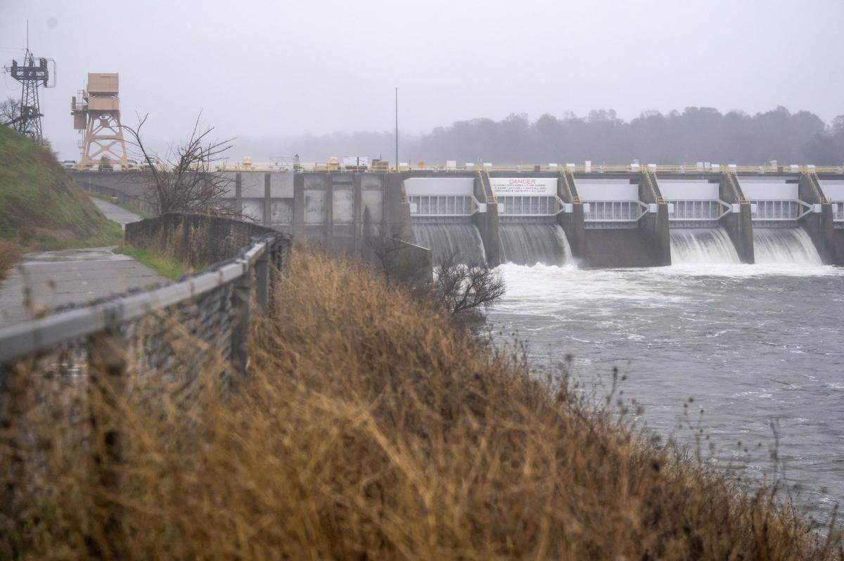 Water is released at Nimbus Dam on the American River on Friday. The operation of Folsom Dam upstream shifted to flood control operations on Thursday to make space in the reservoir for inflows from the expected major storm. Flows on the river were expected to increase from 8,000 cubic feet per second on Friday morning to approximately 25,000 cfs by evening – potentially causing hazardous conditions along the river and at Lake Natoma.