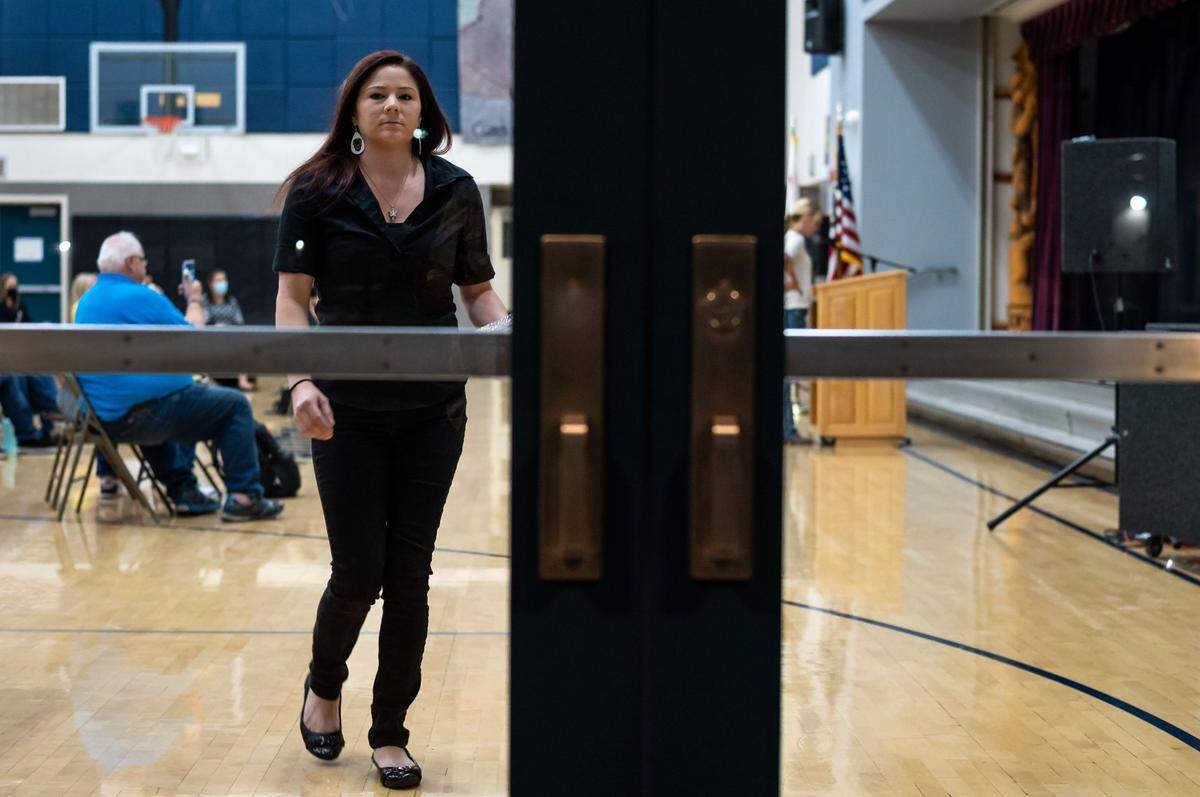 Chelsea Knight, a Placer County mother who has become a leading voice against distance learning and later mask mandates in schools , leaves after speaking about her autistic child during public comment at a Loomis Union School District board meeting in October.