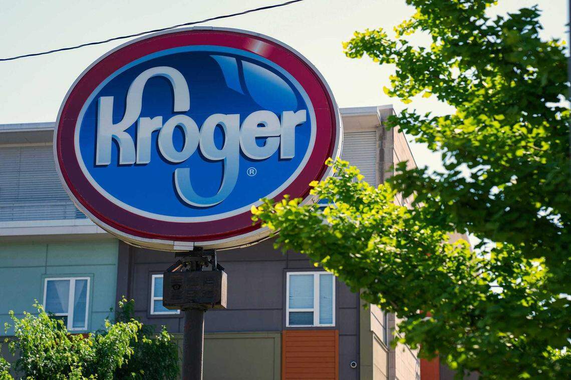 A Kroger sign sits outside one of its supermarkets. in Indianapolis in 2022.
