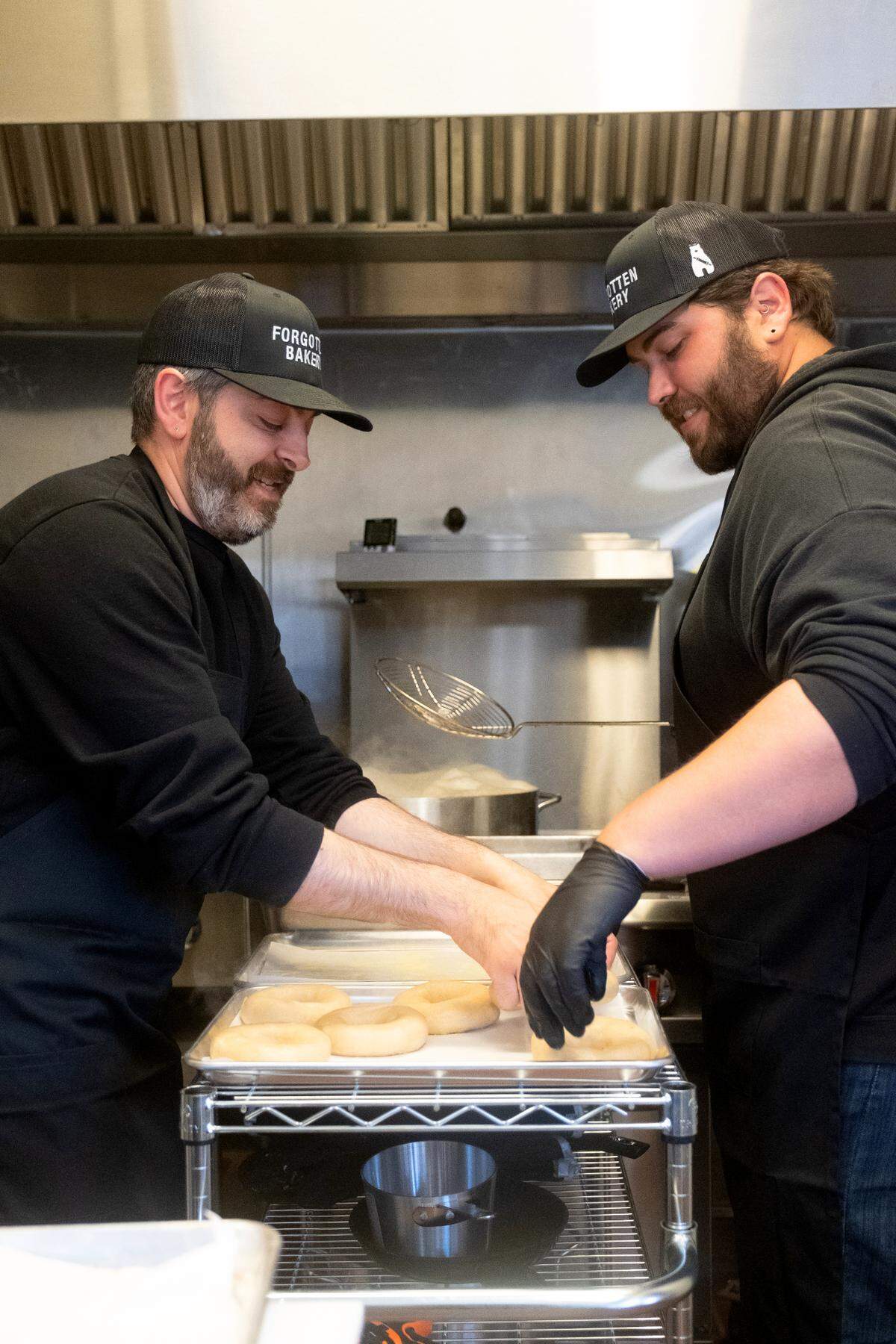Co-founders of the Forgotten Bakery, Robby Naim, left and Paul Dollar.