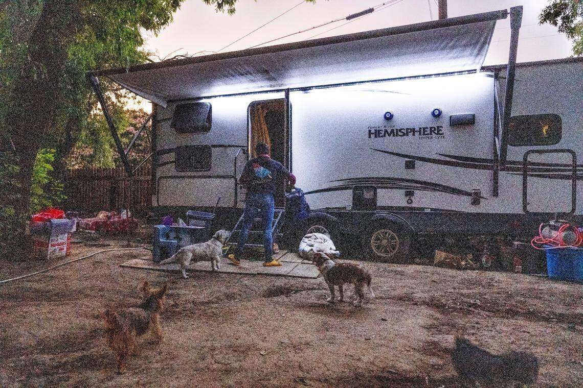 Sayda, a Yolo County farmworker, leaves her mobile home for work earlier this month.