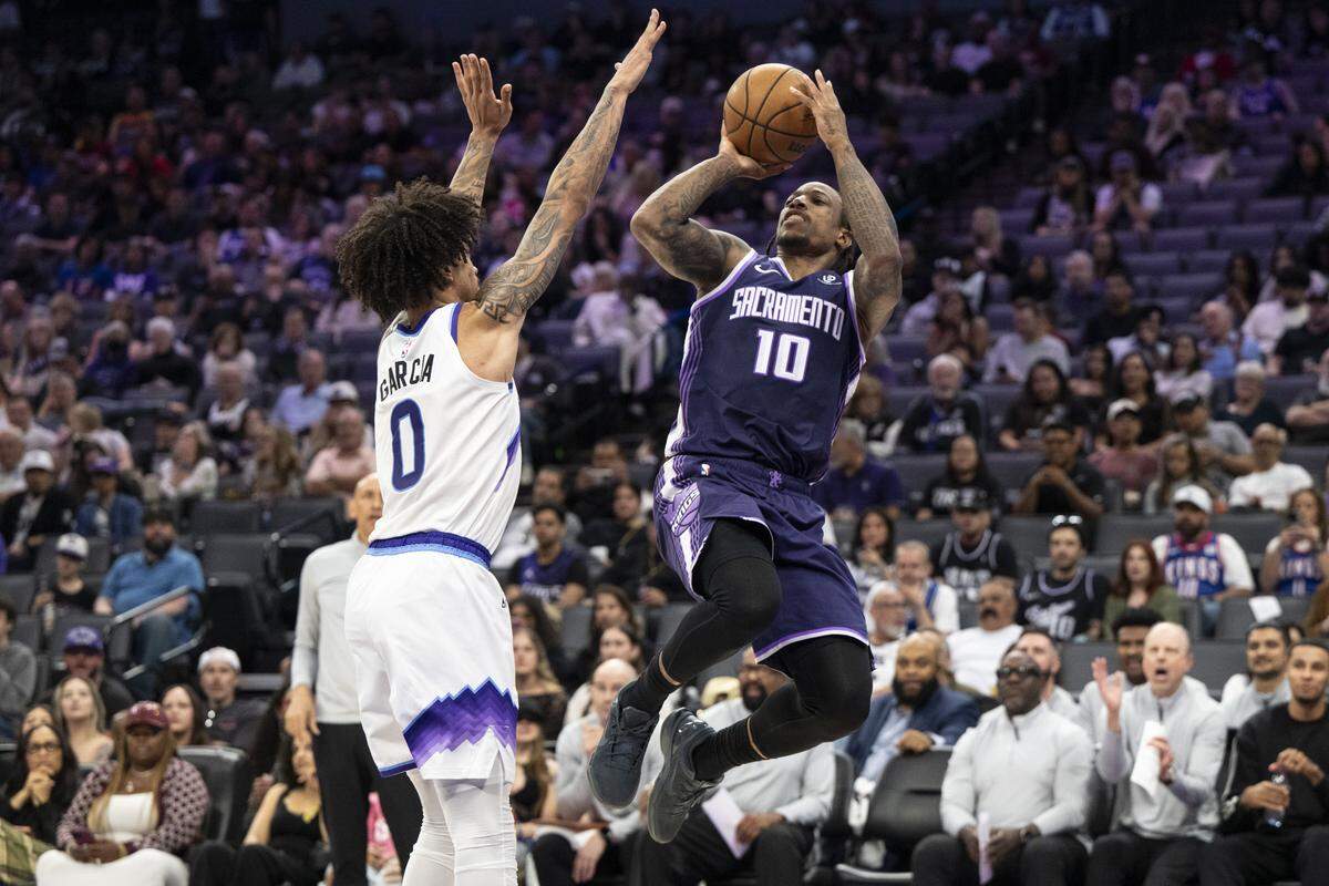 Sacramento Kings guard-forward DeMar DeRozan (10) shoots during a game at Golden 1 Center in Sacramento on Sunday.