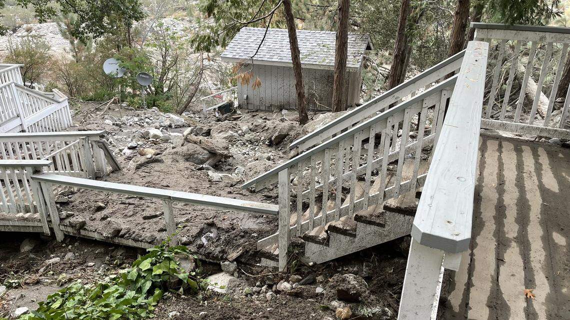 Mudslides hit the Forest Falls and Oak Glen communities in California on Monday, Sept. 12. following a rainstorm. This photo shows a storm damage survey being conducted on the two areas a day after the storm.