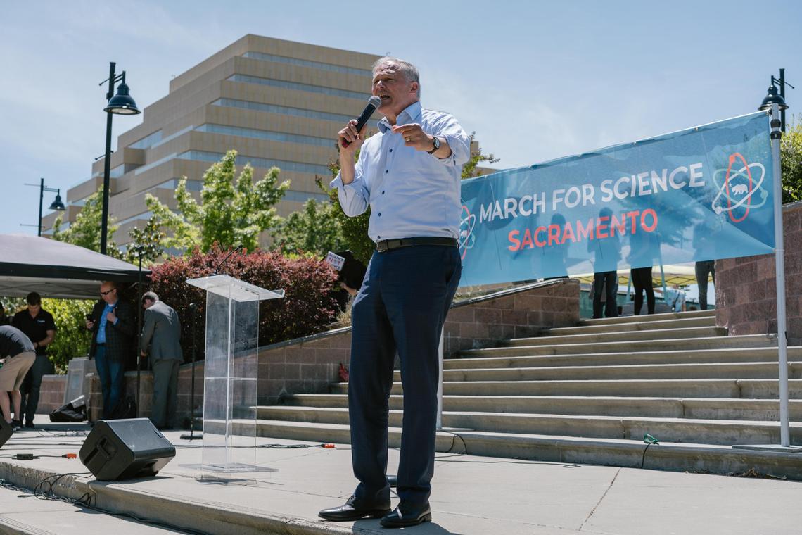 Jay Inslee, Governor of Washington, speaks during the March for Science at River Walk Park in West Sacramento on Saturday.