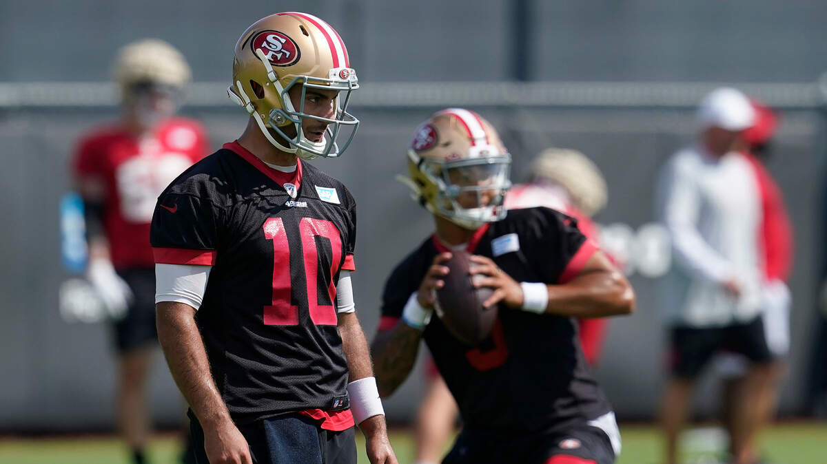 San Francisco 49ers quarterbacks Jimmy Garoppolo, left, and Trey Lance could be exchanging roles soon as Lance continues to look very impressive in practice.