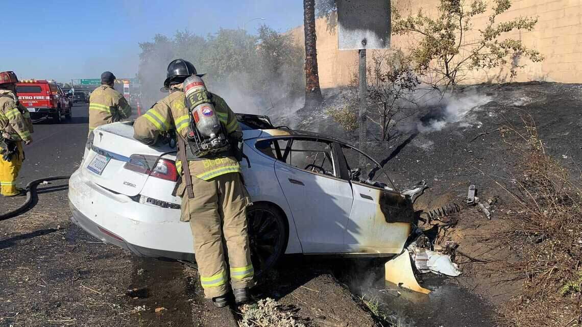 Tesla catches fire on Sacramento freeway, sparks small grass fire near Interstate 80