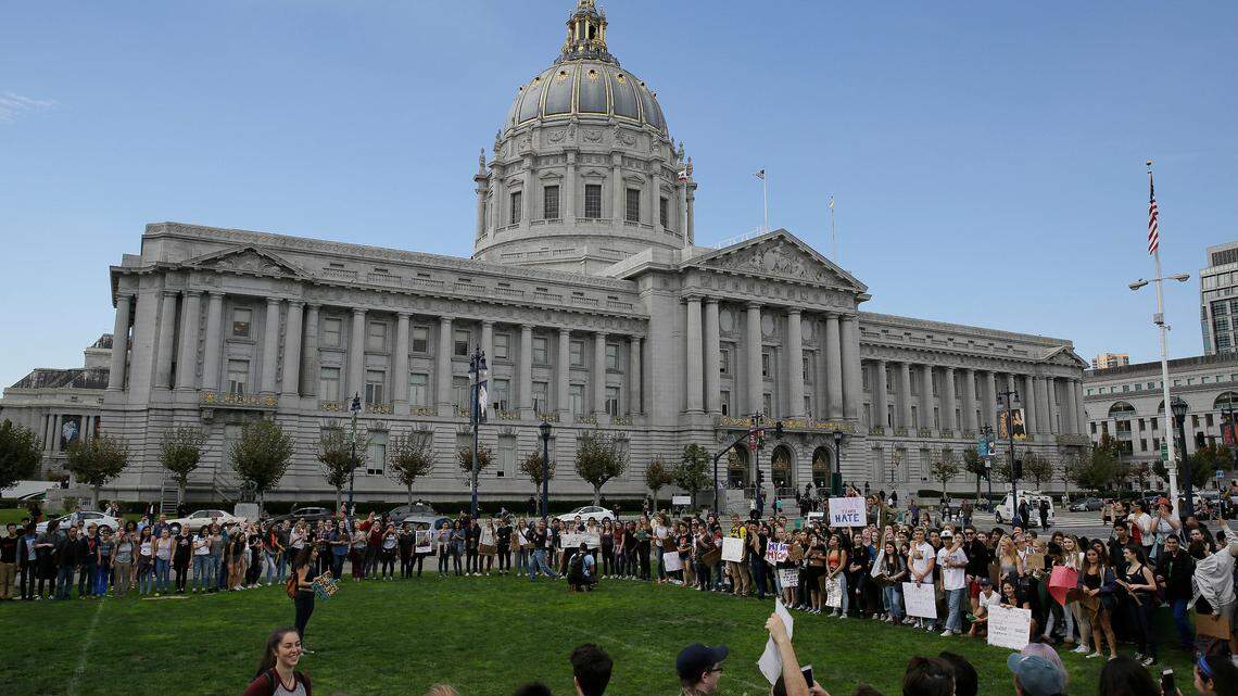 High school students gather to protest in opposition of Donald Trump's presidential election victory outside of City Hall in San Francisco in November 2016. A ballot measure passed in the same election allowing non-citizens to register to vote in school board elections went into effect Monday.