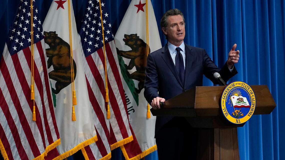 California Gov. Gavin Newsom outlines his 2021-2022 state budget proposal during a news conference in Sacramento on Friday, Jan. 8, 2021.