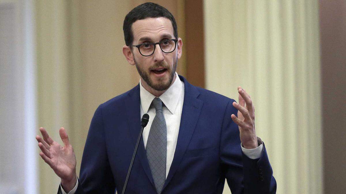 In this June 28, 2018, file photo State Sen. Scott Weiner, D-San Francisco, talks during a Senate hearing in Sacramento.