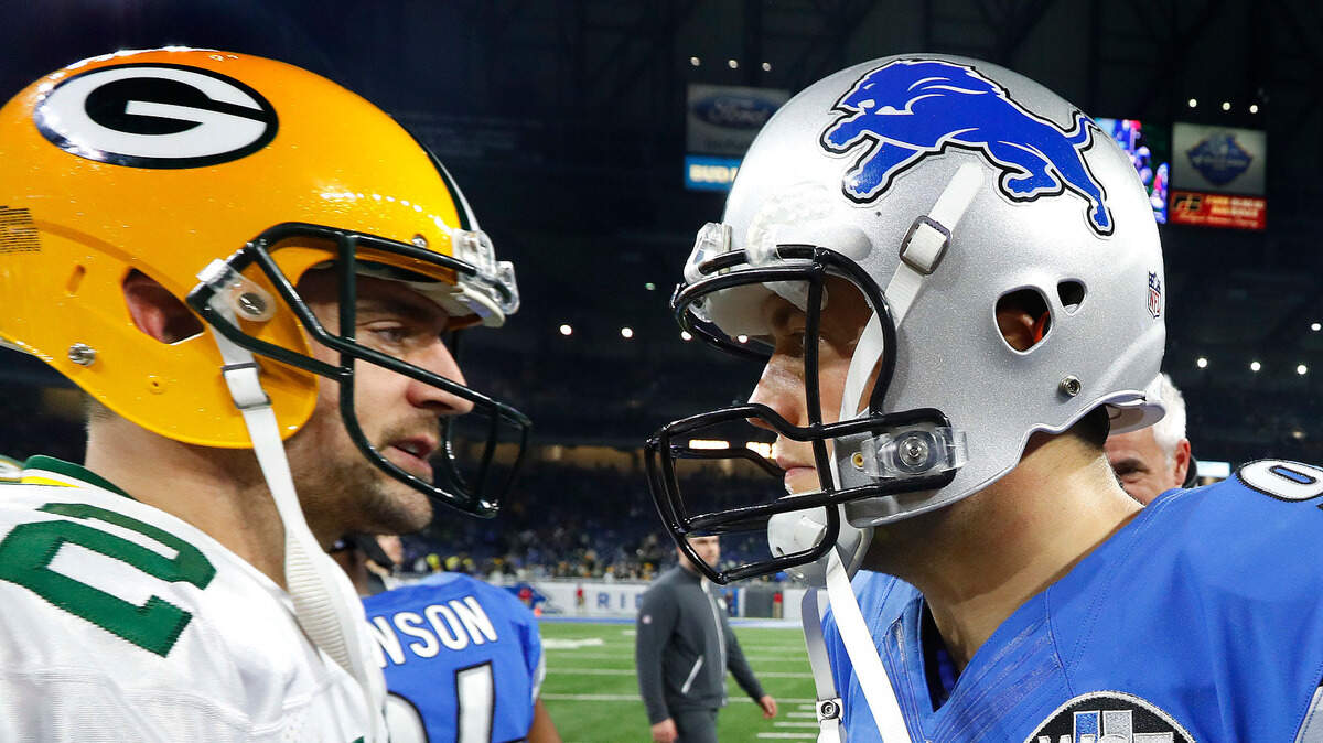 Green Bay Packers quarterback Aaron Rodgers, left, and Detroit Lions quarterback Matthew Stafford greet each other after a 2017 game. Could either one of them be on their way to the 49ers?