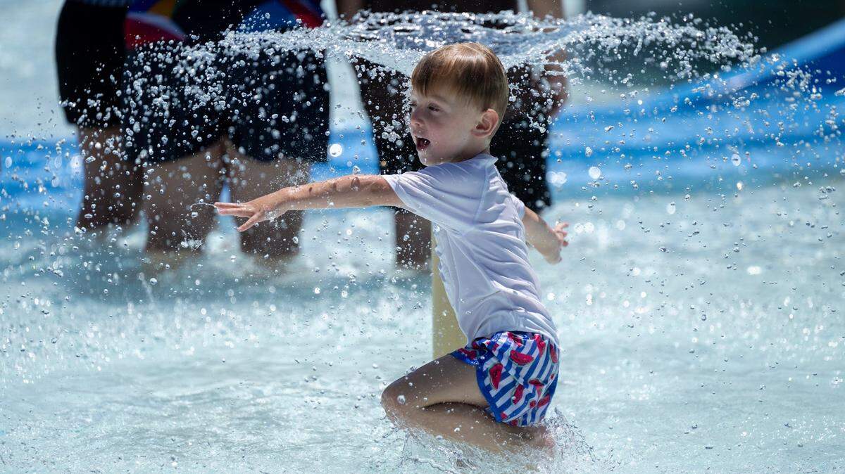 Zayd Gmyr, 4, cools off in the pool at North Natomas Aquatic Complex as temperatures reach 103 degrees on Monday, July 1, 2024 in Sacramento. His mom, Ezra Gmyr, drove from the Arden area to the pool and said he is just learning to swim.