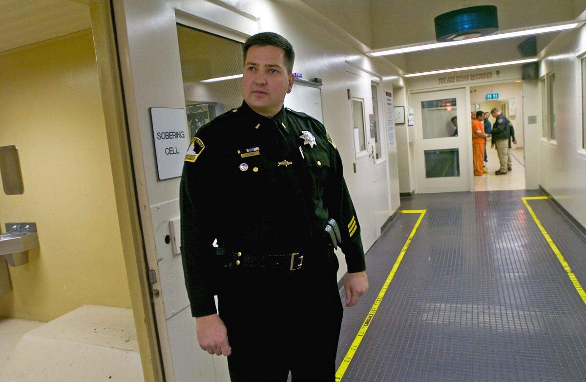 Scott Jones stands in the Sacramento Main Jail in 2007, a few days before becoming its commander after serving there for nine years.