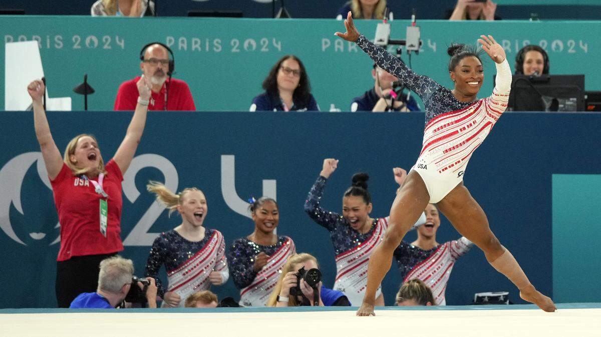 Simone Biles of the United States competes on the floor exercise during the women’s team final at the Paris 2024 Olympic Summer Games at Bercy Arena in Paris on July 30, 2024.