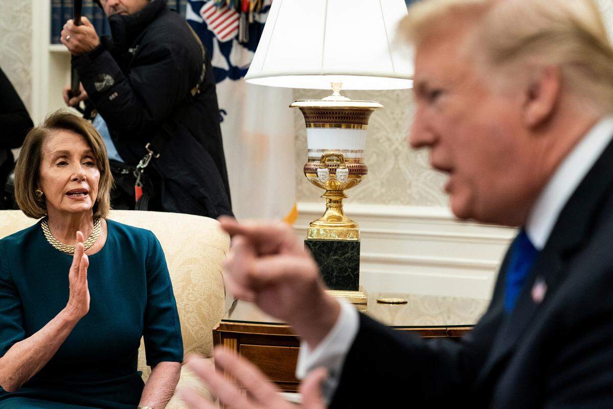Presumptive Speaker House Minority Leader Nancy Pelosi, D-Calif., and President Donald Trump argue while making statements to the press before a meeting at the White House on Dec. 11, 2018 in Washington, D.C.