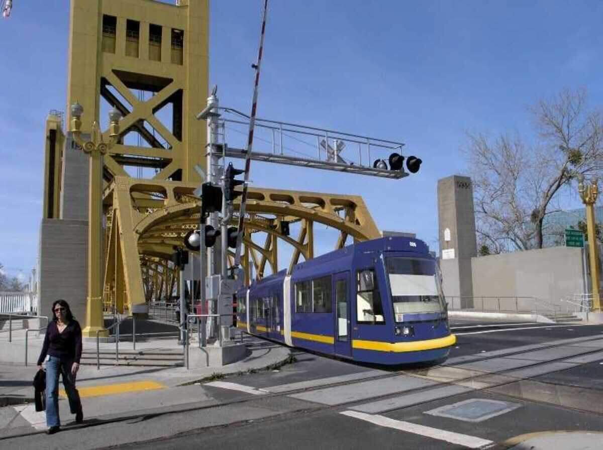 A rendering shows a streetcar traveling over the Tower Bridge. Sacramento Regional Transit is seeking community input over the next three weeks on the proposed $164 million Downtown Riverfront Streetcar Project, which would create the first local rail line over the bridge and connect existing light rail lines to Sutter Health Park and Old Sacramento.