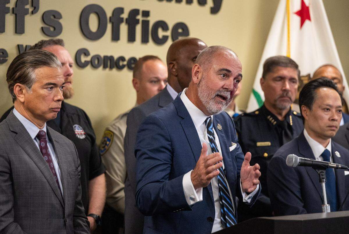 Placer County District Attorney Morgan Gire, joined by California Attorney General Rob Bonta, left, and other local law enforcement officials, speaks on Thursday during a press conference about regional efforts to combat the fentanyl epidemic.