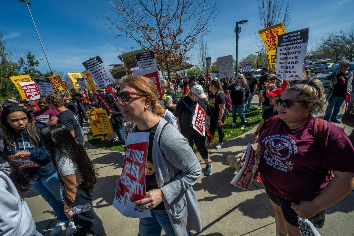 Supporters of the first teacher strike in the history of the Natomas Unified School District gather for a march after a rally at North Natomas Regional Park in Sacramento on Tuesday, March 10, 2026.