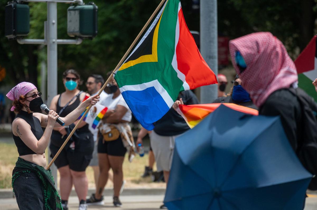 Pro-Palestine protesters gather in front of the 33rd annual Sacramento Pride festival on Saturday, June 8, 2024.