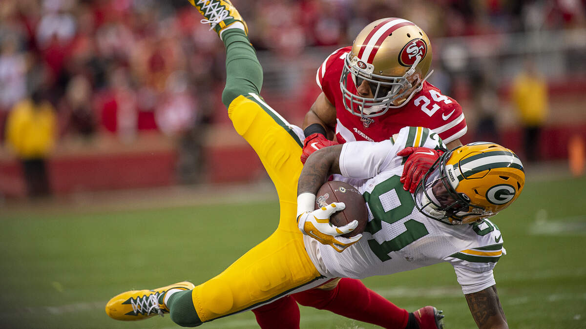 San Francisco 49ers defensive back K’Waun Williams (24) tackles Green Bay Packers wide receiver Geronimo Allison (81) in the first quarter during the NFC Championship at Levi’s Stadium on Sunday, Jan. 19, 2020 in Santa Clara.