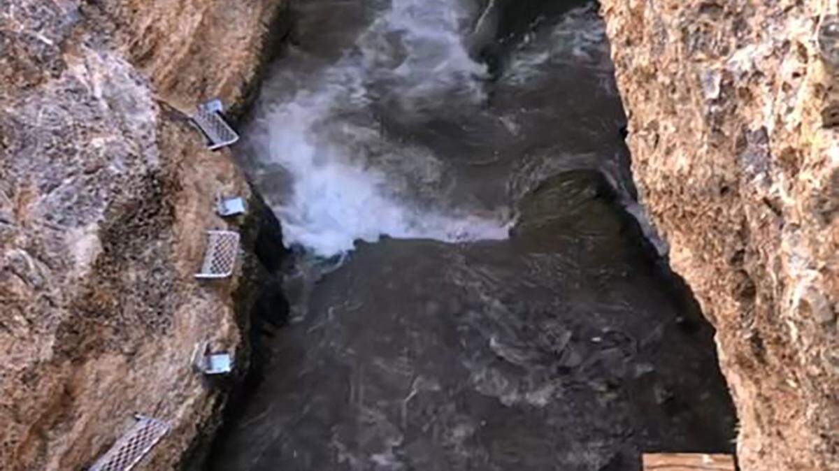 A screengrab of a video shows waves in Devils Hole during the last “desert tsunami” in 2022.