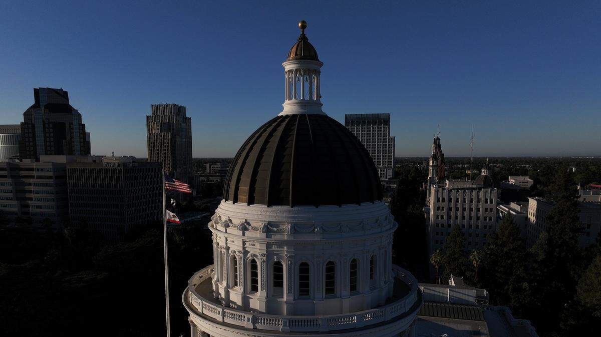An aerial view of the California state Capitol on August 19, 2025 in Sacramento,.  The Legislative Analyst’s Office released a report Wednesday, Nov. 19, 2025, that projects another budget deficit in the 2026-27 fiscal year. 
