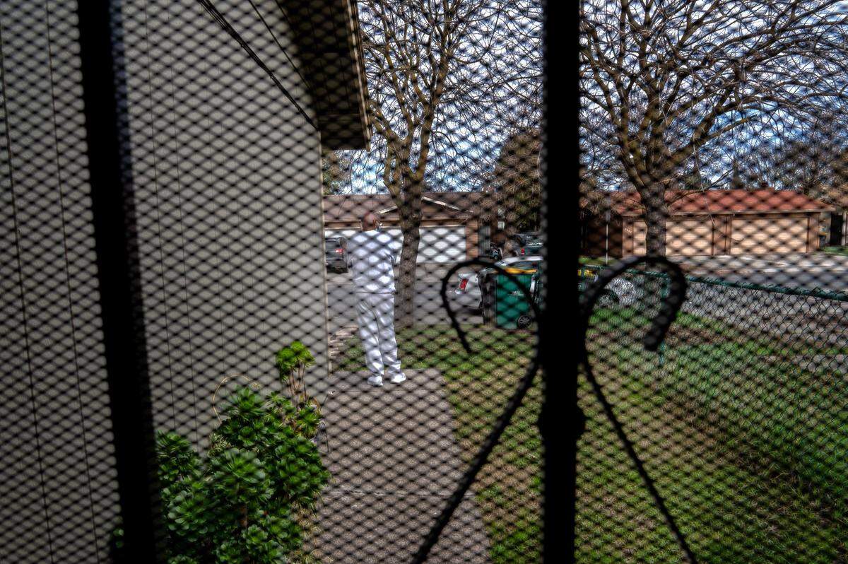 Quinton Watts stands outside the home where his children and ex-wife live in Stockton appreciating the nature around him after serving 12 years in prison. Earlier he hugged the front yard tree. He said a fellow inmate encouraged him to do so when he got out. “We never see trees or nothing in there,” he added. “It’s the smallest things like a tree that can make a big difference.”