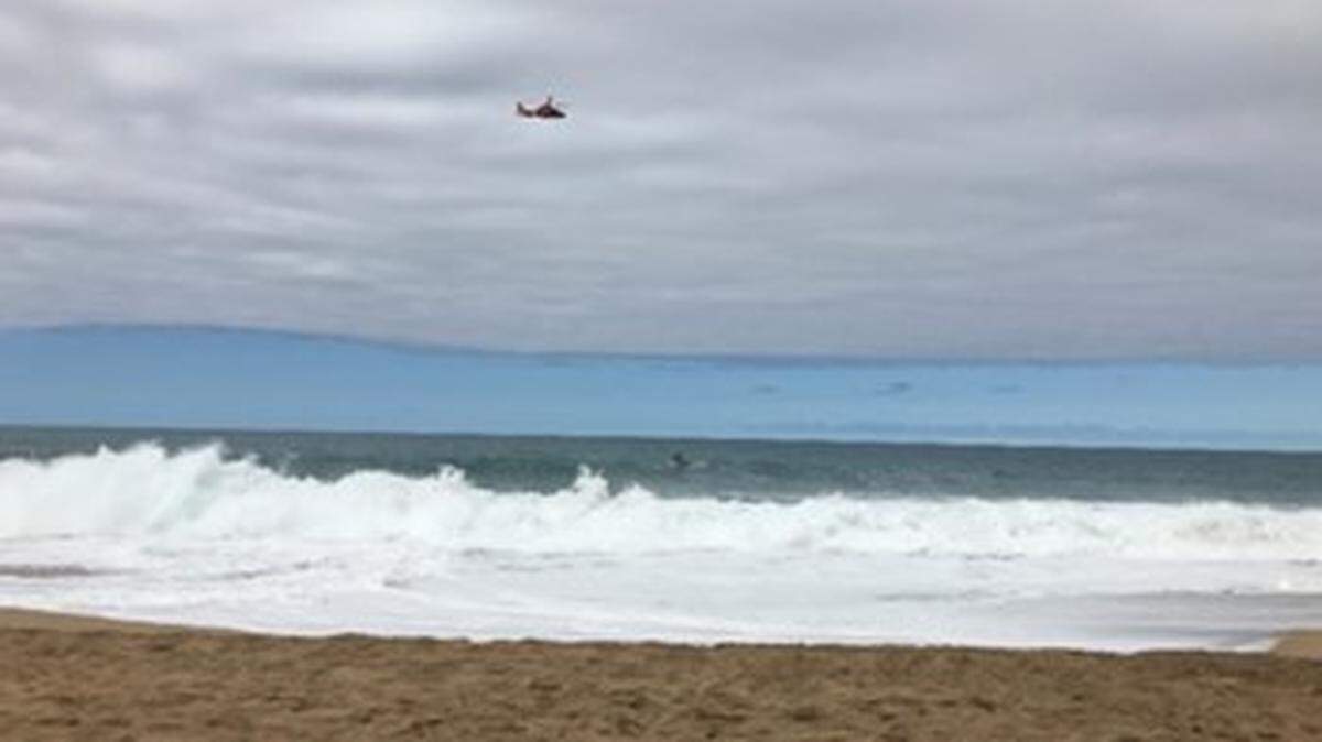A 25-year-old man visiting Hawaii from New Jersey vanished Saturday, March 5, after being swept to sea off a Kauai beach, authorities said.