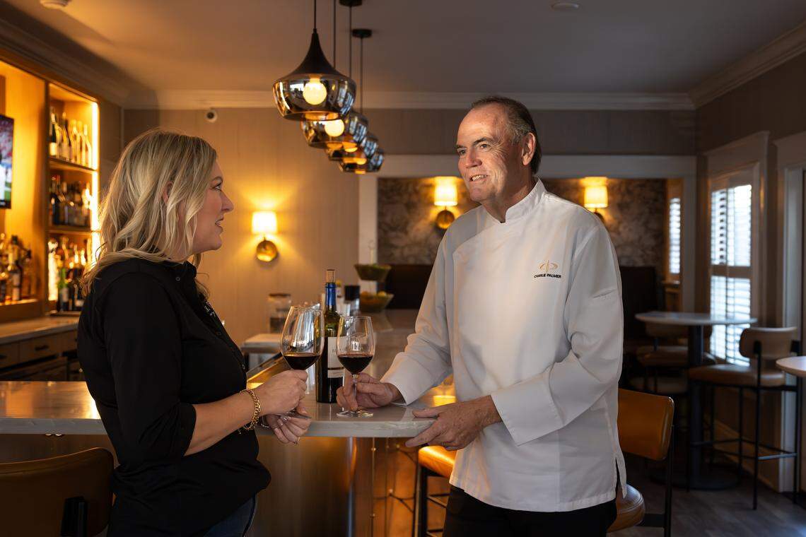 Chef Charlie Palmer tastes wine with Evonne Shinn, owner of Block 21 Winery, at Appellation Lodi - Wine & Roses Resort and Spa on Jan. 8. Block 21 Winery's wines are featured in pairings with dishes by Palmer.