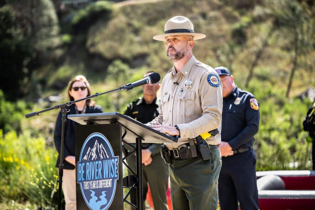 Mike Howard, sector superintendent of the Auburn State Recreation Area, warns of the dangers posed by record snow melt at the American River confluence on Wednesday at a press event where first responders from the Placer County Sheriff’s Office, Cal Fire and California State Parks demonstrated the challenges of river rescue.