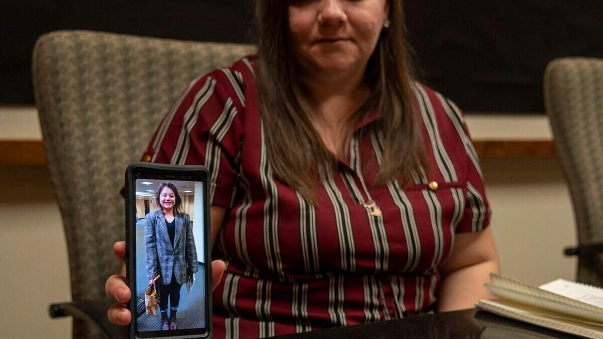 Michele Bryant displays a picture on Friday, Feb. 21, 2020, in her lawyers office of her daughter Kendra Czekaj, 12. Czekaj had been living at the Children’s Receiving Home for 10 days when she joined a group of AWOL teens who ran onto the Capital CIty Freeway. Czekaj was struck by a car and killed.