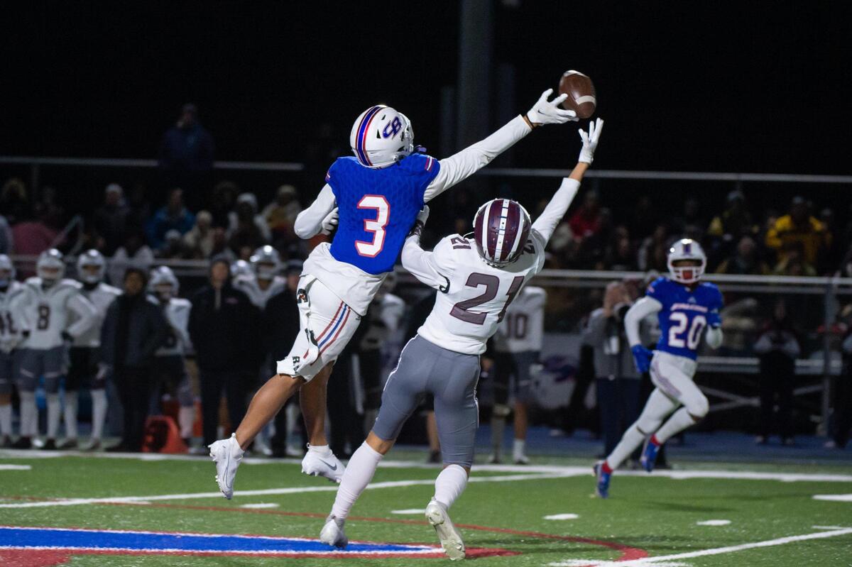 Christian Brothers Falcons defensive back Phillip Bell (3) bats away a pass intended for Woodcreek Timberwolves Giovanni Akyuz (21) during the second half in the CIF Sac-Joaquin Division III semifinals playoff game Friday, Nov. 18, 2022, at Christian Brothers High School in Sacramento. The Falcons won 20-14.