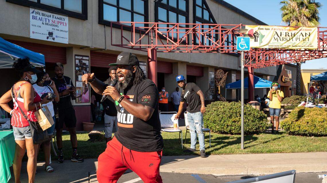 Community activist Berry Accius speaks during The Trap the Vote Block Party held at the African Market Place shortly before the 2020 election at Florin Square in Sacramento.