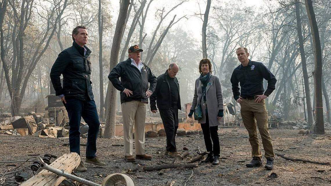 President Donald Trump tours the damage by the Camp Fire in Paradise in November 2018 with then-Gov.-elect Gavin Newson, FEMA Director Brock Long, Paradise mayor Jody Jones and then-Gov. Jerry Brown.