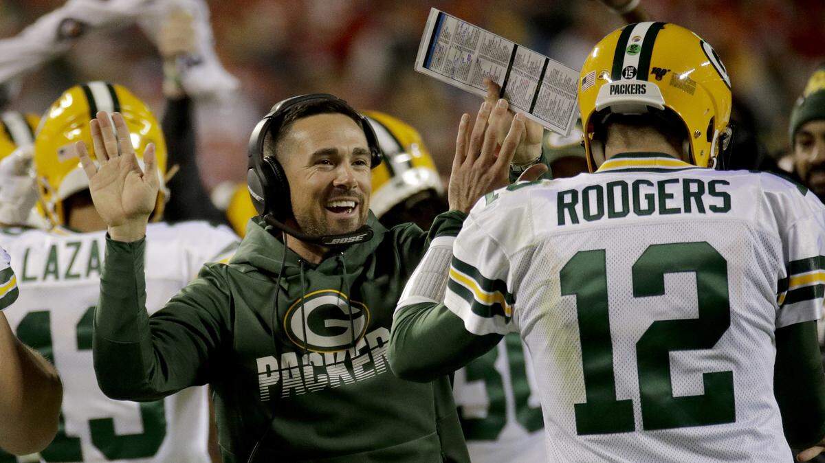 Green Bay Packers coach Matt LaFleur celebrates with quarterback Aaron Rodgers. LaFleur has a longstanding relationship with 49ers coach Kyle Shanahan.