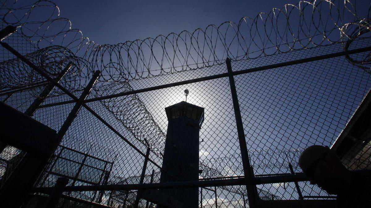 A guard tower stands over the grounds of Pelican Bay State Prison in Crescent City, Calif., in an undated photo. Authorities are investigating the fatal assault of inmate Rodrigo Gomez inside a housing unit at the prison on Saturday, which they are treating as a homicide.